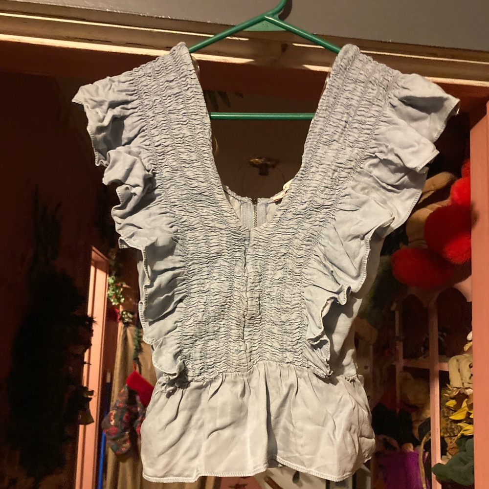A size S sky blue blouse